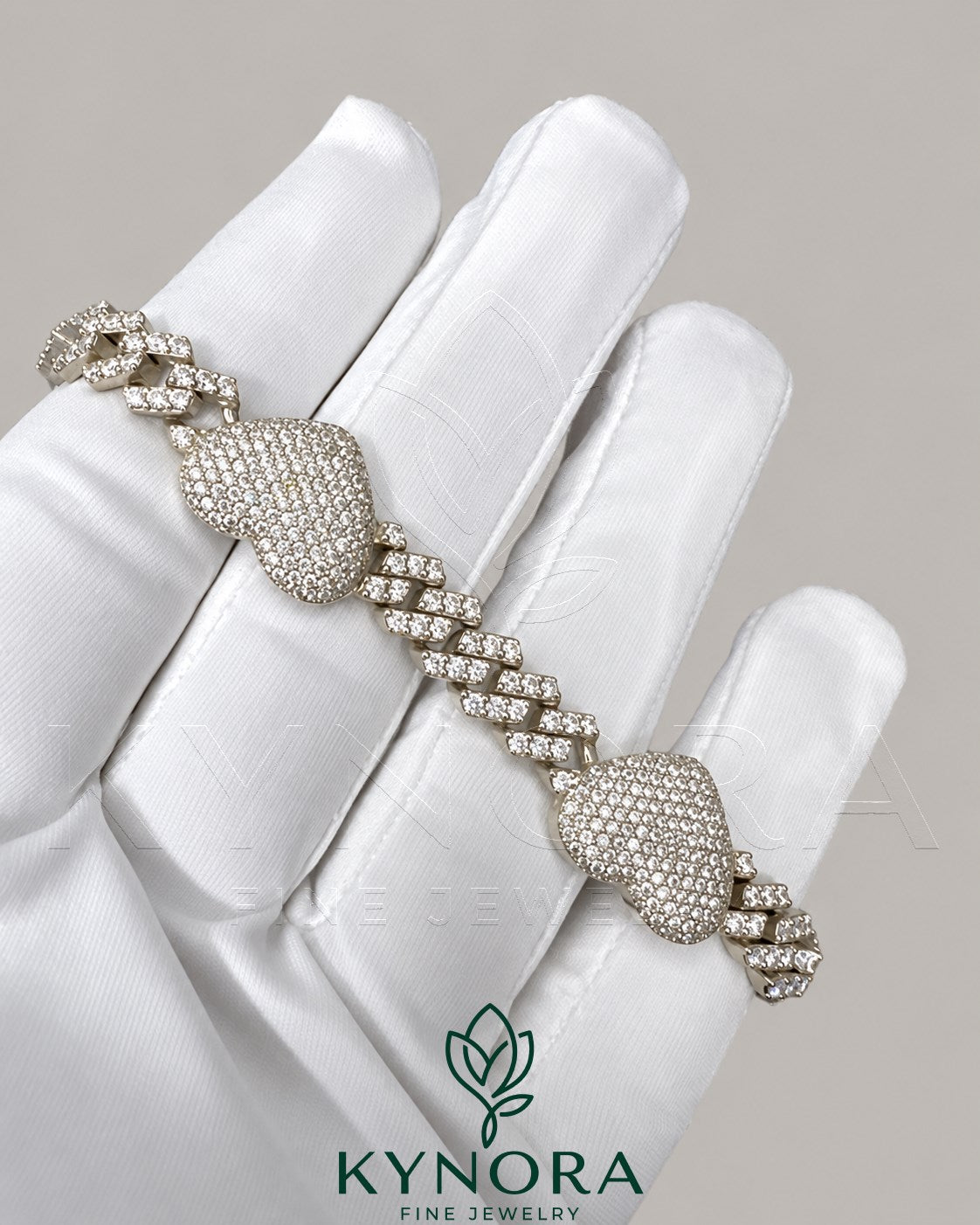 12mm men's VVS moissanite heart Cuban bracelet by Kynora Jewels featuring a sleek hip-hop style design.