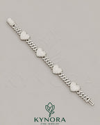 Men's 12mm VVS Moissanite Heart Cuban bracelet by Kynora Jewels, hip-hop style jewelry featuring sparkling moissanite stones.
