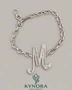 VVS Moissanite diamond "M" sterling silver anklet by Kynora Jewels featuring a hip-hop bracelet design with intricate detailing.