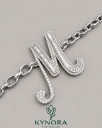 VVS Moissanite diamond "M" sterling silver anklet from Kynora Jewels, hip-hop style bracelet with elegant design.