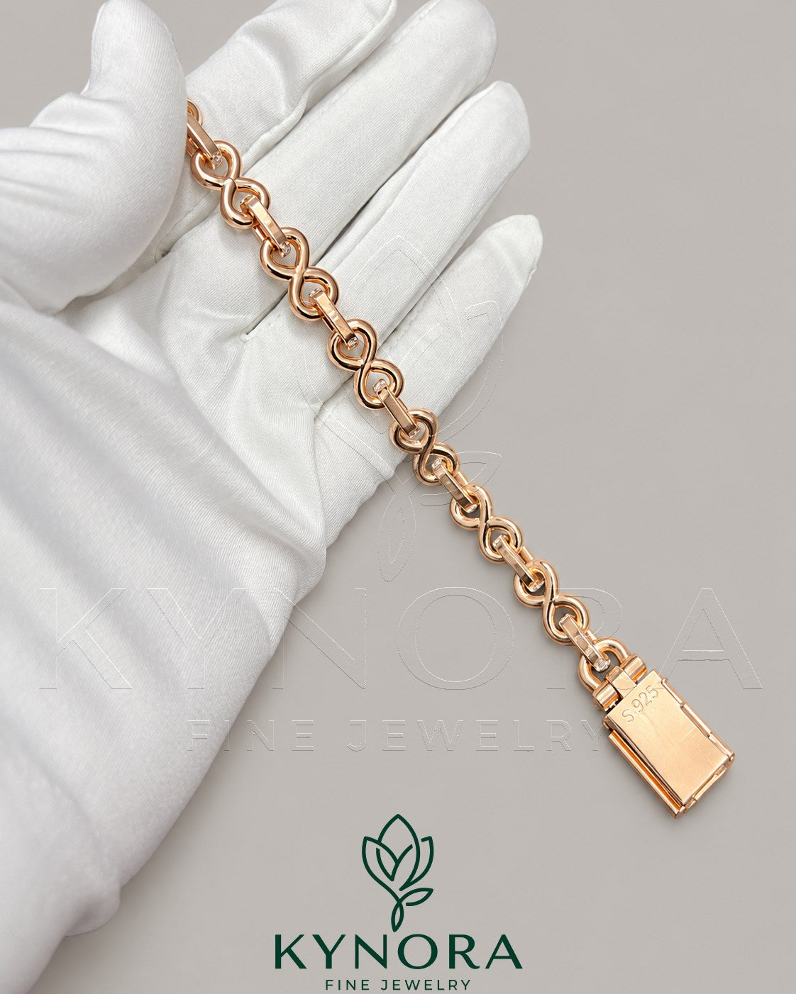 Sterling silver hip-hop bracelet with 10mm VVS moissanite diamonds and infinity design by Kynora Jewels