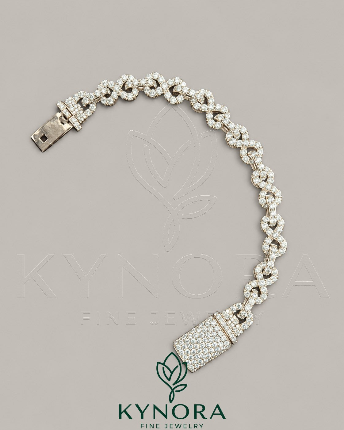 Sterling silver hip-hop bracelet with 10mm VVS moissanite diamonds and infinity design by Kynora Jewels.