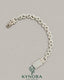 Sterling silver hip-hop bracelet with 10mm VVS moissanite diamonds and infinity design by Kynora Jewels.