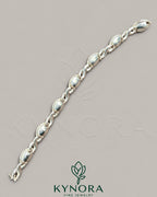 Infinity Evil Eye moissanite diamond men's bracelet in 925 silver, hip-hop style by Kynora Jewels.