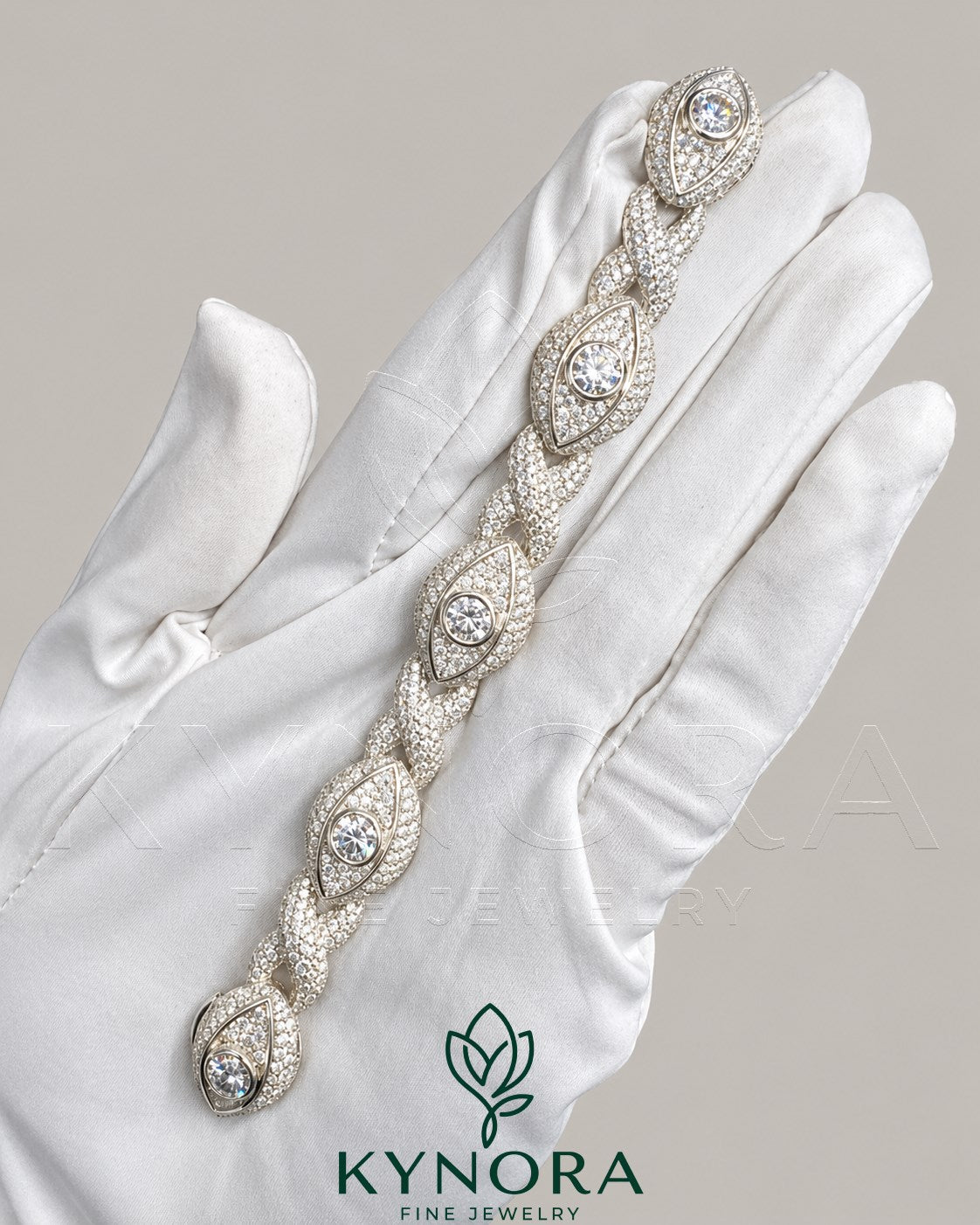 Men's silver Hiphop bracelet with Infinity Evil Eye design featuring moissanite diamonds by Kynora Jewels.
