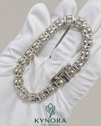 Men's 10mm VVS Moissanite round silver tennis bracelet by Kynora Jewels, stylish hip-hop bracelet with sparkling gemstones.