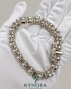 VVS moissanite round silver tennis bracelet for men, 10mm, hip-hop style, crafted by Kynora Jewels, elegant jewelry accessory.