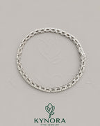 Sterling silver Kynora Jewels 6mm diamond tennis bracelet with hip hop style design and sparkling diamonds.